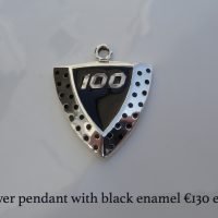 Victory Motorcycles pendant 100 with black enamel.