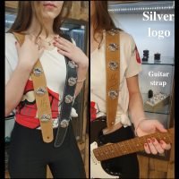 Guitar-Straps with silver logo’s made on it.