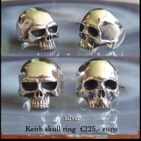 Silver Skull rings A. or B.