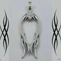 Silver tribal / rebel pendant.